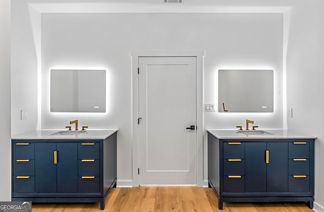 1835 Taylor Ave, East Point, GA 30344 - bathroom with wood finished floors and two vanities