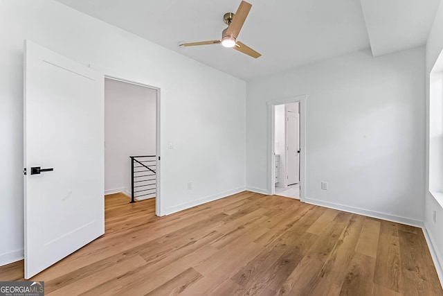 1835 Taylor Ave, East Point, GA 30344 - empty room with light wood-style flooring, a ceiling fan, and baseboards