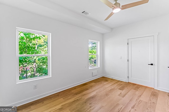 1835 Taylor Ave, East Point, GA 30344 - empty room with light wood-style floors, a ceiling fan, and baseboards