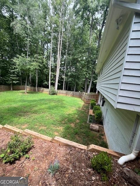 1221 Martin Nash Rd SW, Lilburn, GA 30047 - view of yard featuring view of scattered trees