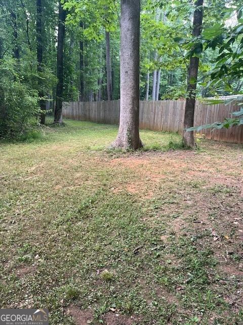 1221 Martin Nash Rd SW, Lilburn, GA 30047 - view of yard