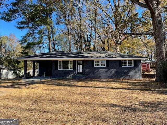 4905 Sweet Valley Rd SW, Mableton, GA 30126 - single story home with crawl space, a carport, brick siding, driveway, and a front yard