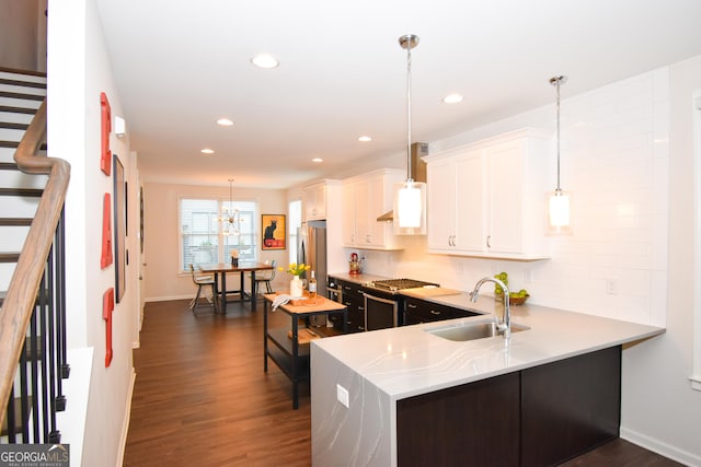 756 Cady Way, Atlanta, GA 30312 - kitchen with dark wood-style floors, white cabinetry, backsplash, recessed lighting, and stainless steel refrigerator