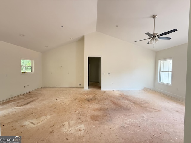 spare room featuring vaulted ceiling and ceiling fan