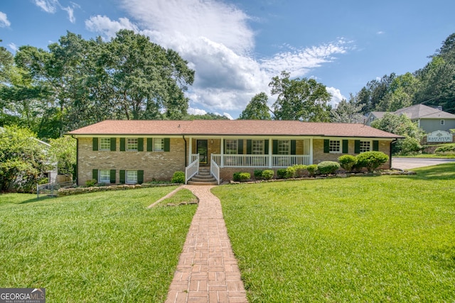 12 Riverview Rd SE, Rome, GA 30161 - ranch-style house with a porch, brick siding, and a front yard