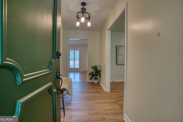 12 Riverview Rd SE, Rome, GA 30161 - foyer entrance with light wood-style floors, baseboards, and a chandelier