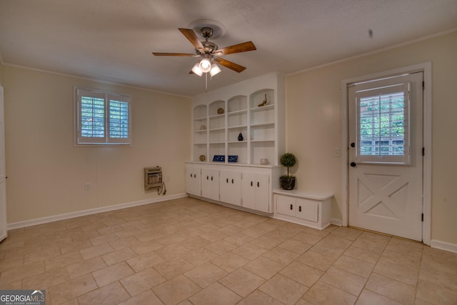 12 Riverview Rd SE, Rome, GA 30161 - spare room with plenty of natural light, a ceiling fan, crown molding, heating unit, and baseboards