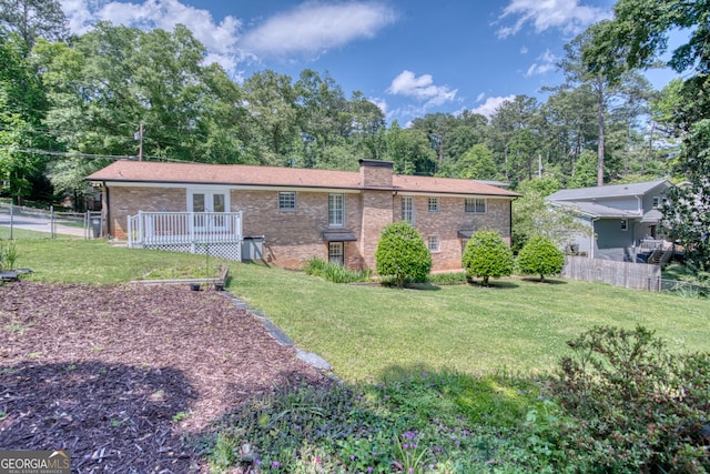 12 Riverview Rd SE, Rome, GA 30161 - back of property with brick siding, a chimney, and french doors