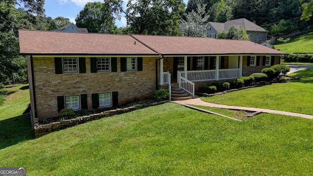 12 Riverview Rd SE, Rome, GA 30161 - ranch-style home with a porch, brick siding, roof with shingles, a front lawn, and central AC unit
