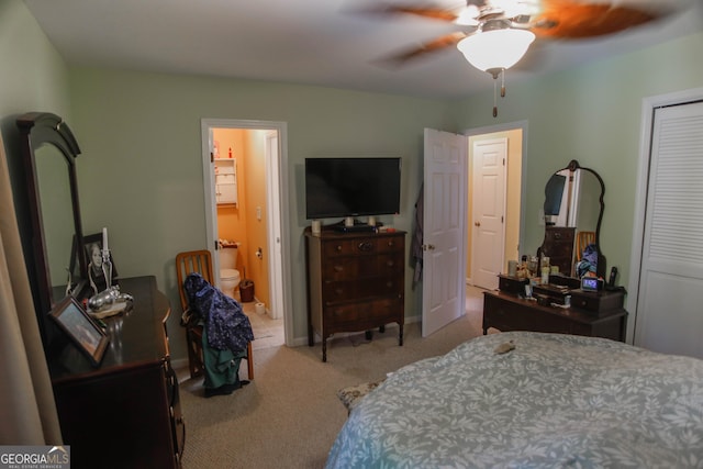 6500 Gaines Ferry Rd Unit G2, Flowery Branch, GA 30542 - carpeted bedroom with a closet, connected bathroom, and ceiling fan