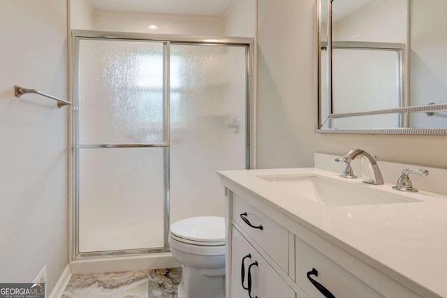 full bath with a shower stall, toilet, vanity, and marble finish flooring