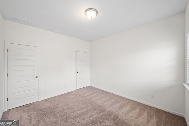 235 Centennial Cir, Canton, GA 30114 - carpeted spare room featuring baseboards
