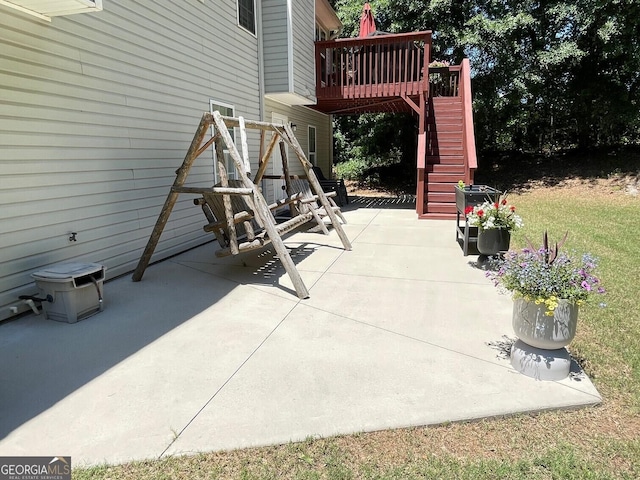 397 E Sycamore Dr, Winder, GA 30680 - view of patio / terrace featuring stairway and a deck