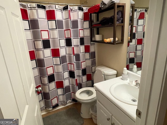 397 E Sycamore Dr, Winder, GA 30680 - bathroom with vanity, toilet, and curtained shower