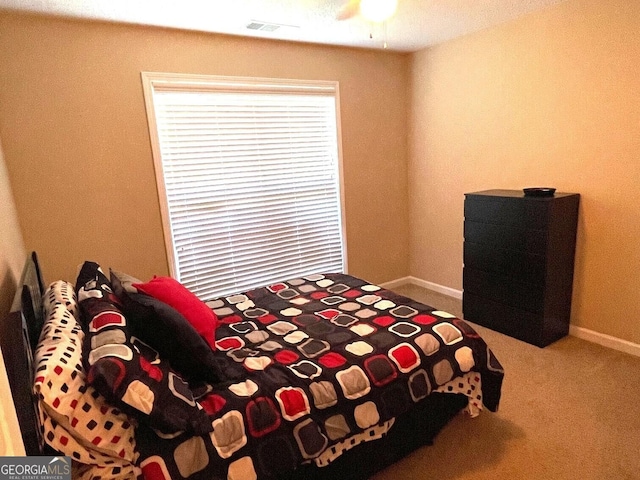 397 E Sycamore Dr, Winder, GA 30680 - carpeted bedroom with baseboards