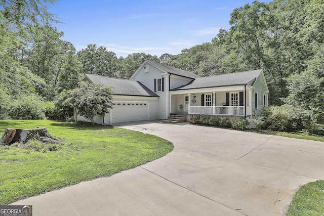 109 Cannon Rd, Sharpsburg, GA 30277 - split level home with a porch, concrete driveway, an attached garage, a front yard, and a shingled roof