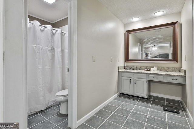 109 Cannon Rd, Sharpsburg, GA 30277 - bathroom with tile patterned flooring, a textured ceiling, baseboards, vanity, and ceiling fan