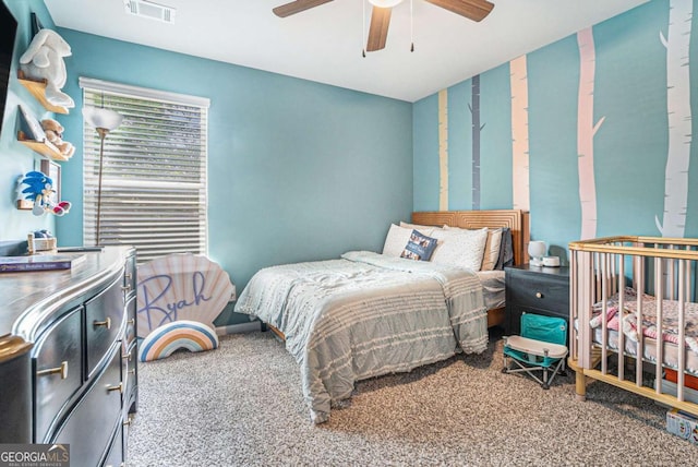 450 Rockfern Ct, Lilburn, GA 30047 - carpeted bedroom featuring ceiling fan