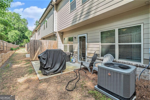 450 Rockfern Ct, Lilburn, GA 30047 - view of yard featuring cooling unit, fence, and a patio area