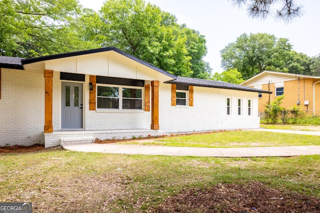 754 Wright Dr, Columbus, GA 31907 - view of front of house featuring brick siding and a front lawn