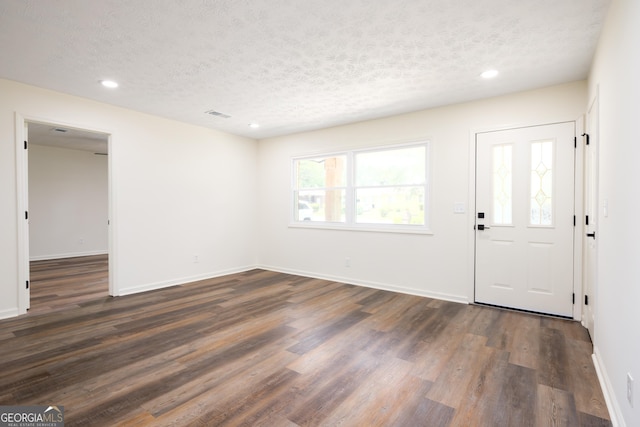 754 Wright Dr, Columbus, GA 31907 - foyer with a textured ceiling, dark wood finished floors, and recessed lighting