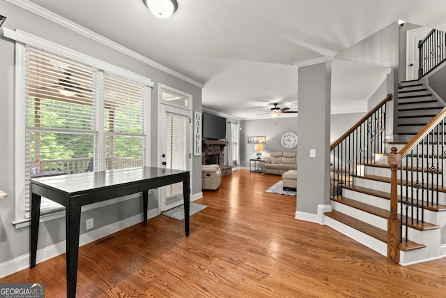 1050 Double Branches Ln, Dallas, GA 30132 - entryway featuring ceiling fan, stairs, crown molding, baseboards, and light wood-style flooring