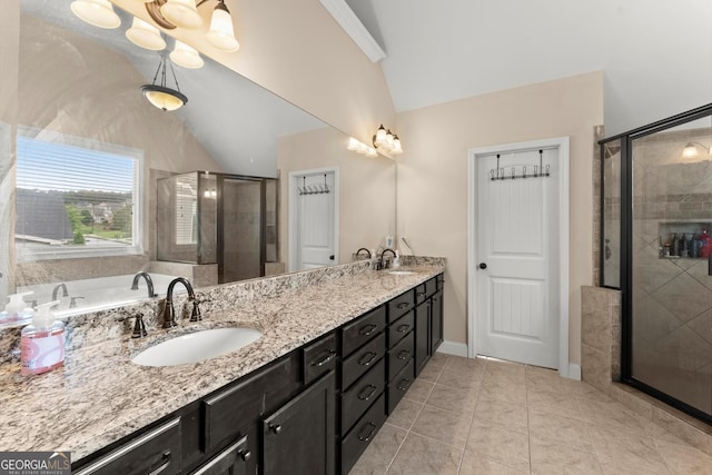 1050 Double Branches Ln, Dallas, GA 30132 - bathroom with vaulted ceiling, double vanity, a stall shower, tile patterned floors, and baseboards