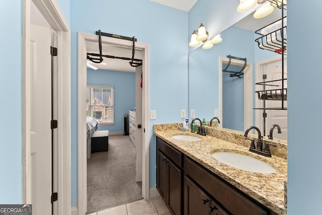 1050 Double Branches Ln, Dallas, GA 30132 - bathroom featuring connected bathroom, double vanity, tile patterned floors, and baseboards