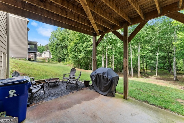 1050 Double Branches Ln, Dallas, GA 30132 - view of patio / terrace featuring an outdoor fire pit, a grill, and view of scattered trees