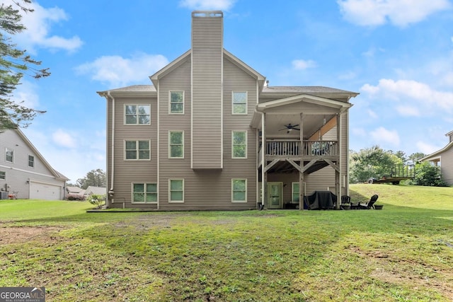 1050 Double Branches Ln, Dallas, GA 30132 - back of property with ceiling fan, a lawn, a chimney, and a balcony