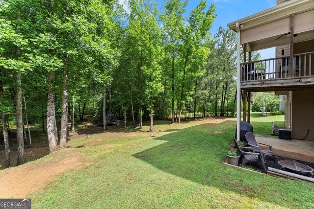 1050 Double Branches Ln, Dallas, GA 30132 - view of green lawn featuring a patio