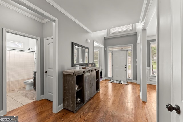 1050 Double Branches Ln, Dallas, GA 30132 - foyer entrance with light wood finished floors, ornamental molding, and baseboards