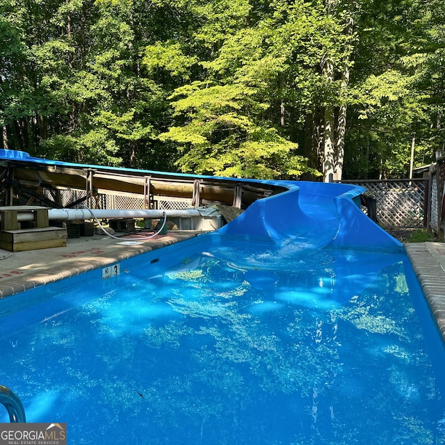 77 Hollow Log Path, Cleveland, GA 30528 - view of pool with a forest view