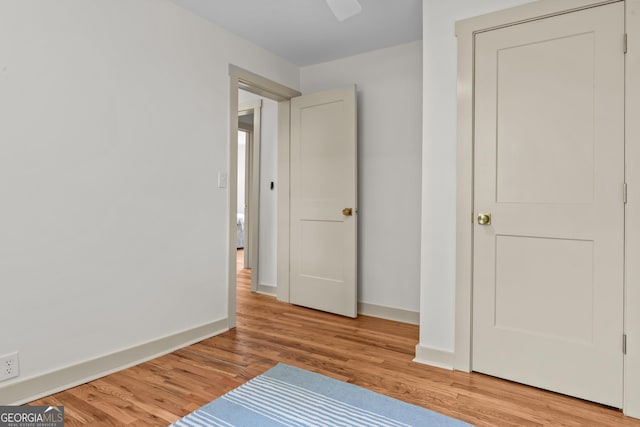 492 Clover St, Athens, GA 30606 - unfurnished bedroom with wood finished floors and baseboards