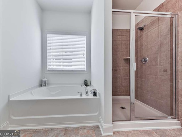 631 Naturewalk Blvd, Dallas, GA 30132 - full bathroom with a stall shower and a garden tub