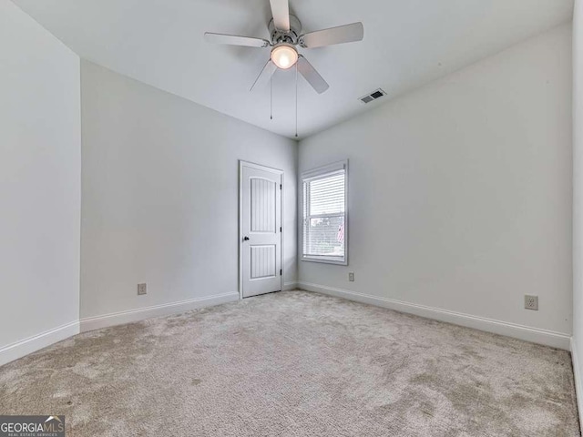 631 Naturewalk Blvd, Dallas, GA 30132 - carpeted spare room with baseboards and ceiling fan