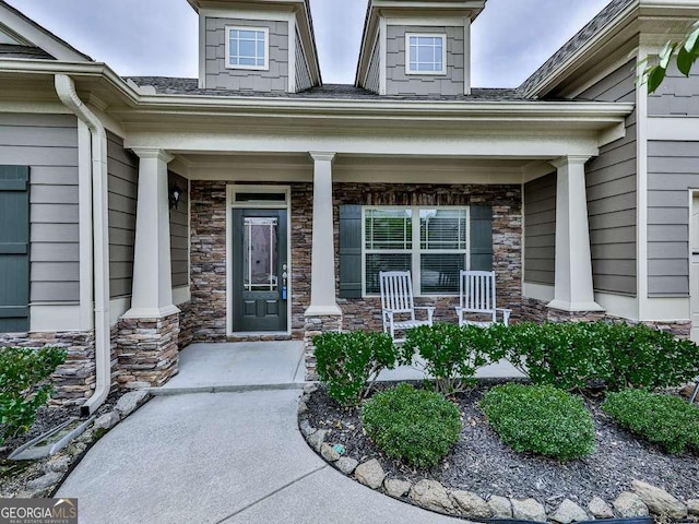631 Naturewalk Blvd, Dallas, GA 30132 - doorway to property with a porch and stone siding