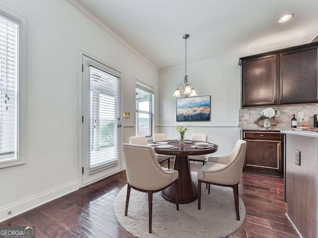 631 Naturewalk Blvd, Dallas, GA 30132 - dining area with ornamental molding, dark wood-style floors, a chandelier, and recessed lighting