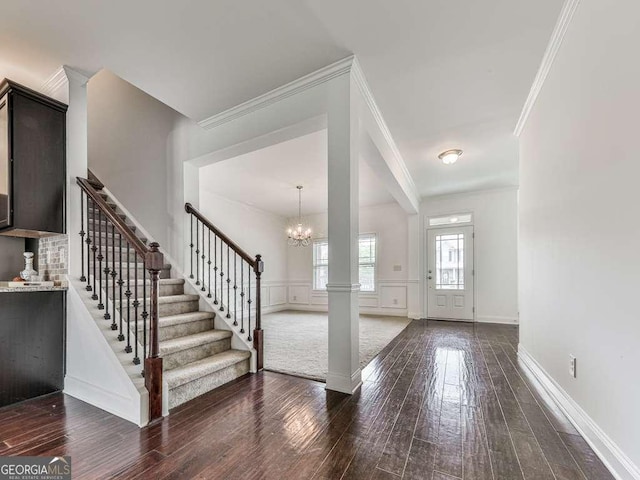 631 Naturewalk Blvd, Dallas, GA 30132 - foyer entrance featuring wood-type flooring, stairs, ornamental molding, and a chandelier