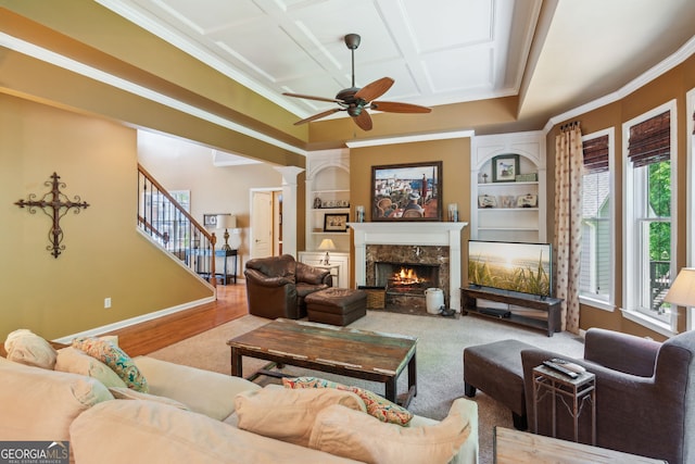 1320 Magnolia Park Cir, Cumming, GA 30040 - living area with a ceiling fan, decorative columns, a fireplace, ornamental molding, and coffered ceiling