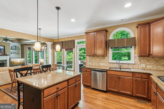 1320 Magnolia Park Cir, Cumming, GA 30040 - kitchen featuring dishwasher, a breakfast bar area, light stone counters, brown cabinetry, and open floor plan