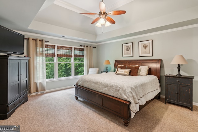 1320 Magnolia Park Cir, Cumming, GA 30040 - bedroom featuring light carpet, a tray ceiling, crown molding, and ceiling fan