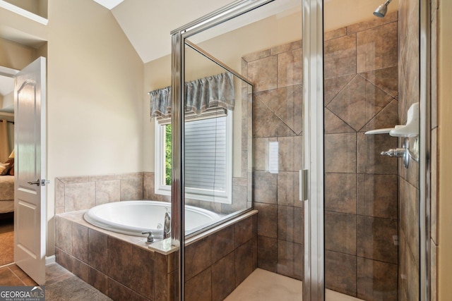 1320 Magnolia Park Cir, Cumming, GA 30040 - ensuite bathroom featuring a garden tub, a stall shower, vaulted ceiling, and tile patterned floors