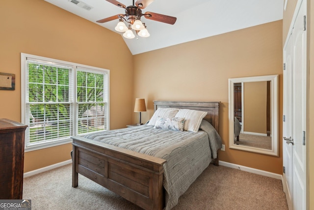 1320 Magnolia Park Cir, Cumming, GA 30040 - carpeted bedroom with lofted ceiling, multiple windows, and ceiling fan
