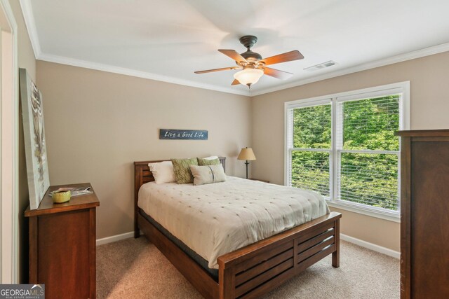 1320 Magnolia Park Cir, Cumming, GA 30040 - bedroom with light carpet, multiple windows, crown molding, and a ceiling fan