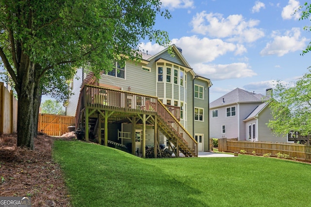 1320 Magnolia Park Cir, Cumming, GA 30040 - rear view of property with stairway, a fenced backyard, and a deck