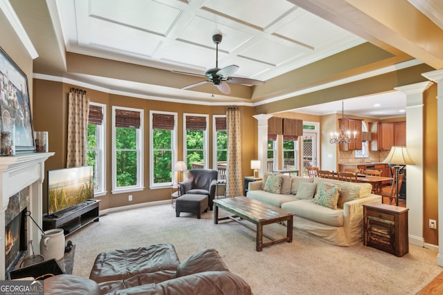 1320 Magnolia Park Cir, Cumming, GA 30040 - carpeted living area with a premium fireplace, a ceiling fan, ornate columns, coffered ceiling, and ornamental molding