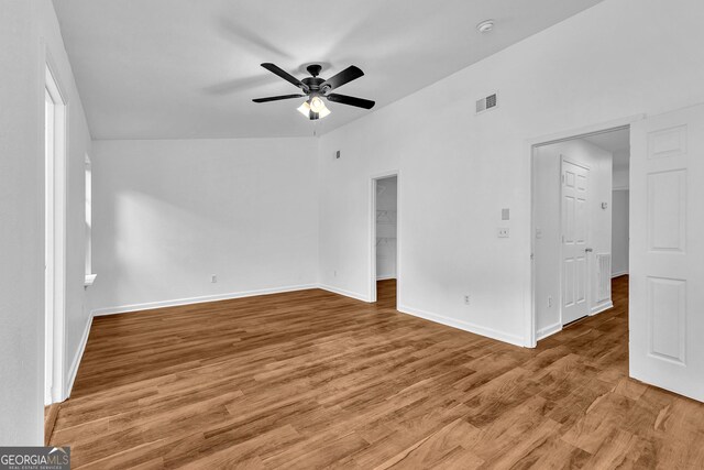 2849 Windsor Forrest Ct, Atlanta, GA 30349 - spare room featuring a ceiling fan, baseboards, wood finished floors, and a smoke detector