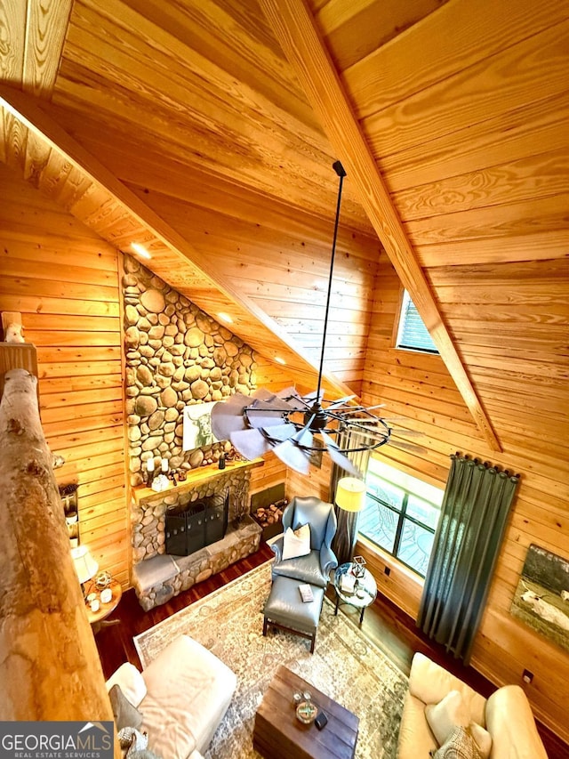 570 July Rd, Rochelle, GA 31079 - living room featuring wood ceiling with exposed beams, wood walls, and wood finished floors