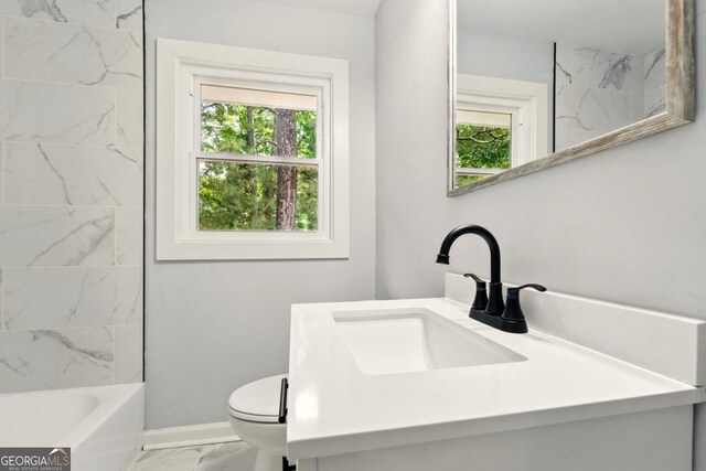 163 Oakcliff Ct, Atlanta, GA 30331 - full bath featuring marble look tiles, toilet, baseboards, vanity, and shower / bathtub combination